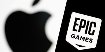 FILE PHOTO: Smartphone with Epic Games logo is seen in front of Apple logo in this illustration