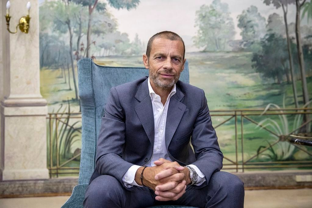 UEFA President Aleksander Ceferin poses for a picture during an interview with The Associated Press in Lisbon, Portugal, Sunday, Aug. 23, 2020. Ceferin stressed he would consult widely before pushing for any permanent changes to the format, but said many people were “extremely excited” by the final eight format adopted because of the coronavirus pandemic.(AP Photo/Manu Fernandez)