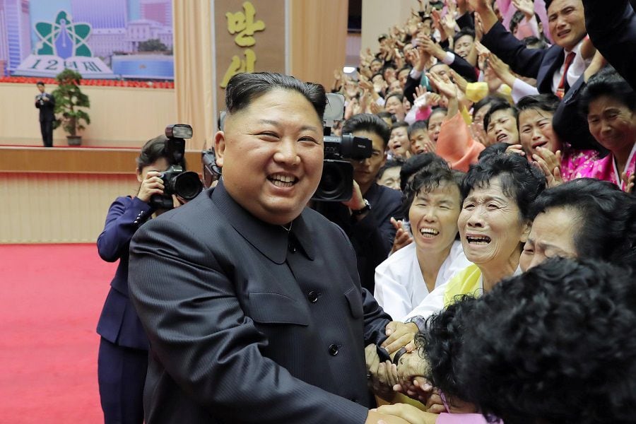 North Korean leader Kim Jong Un greets participants of a National Conference of Teachers in Pyongyang