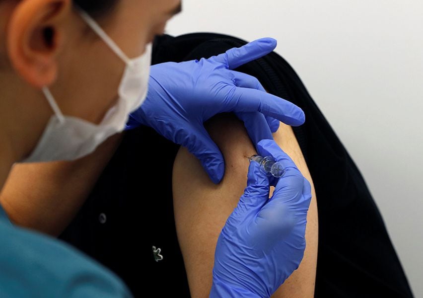 A volunteer is injected with an experimental Chinese coronavirus (COVID-19) vaccine in Kocaeli