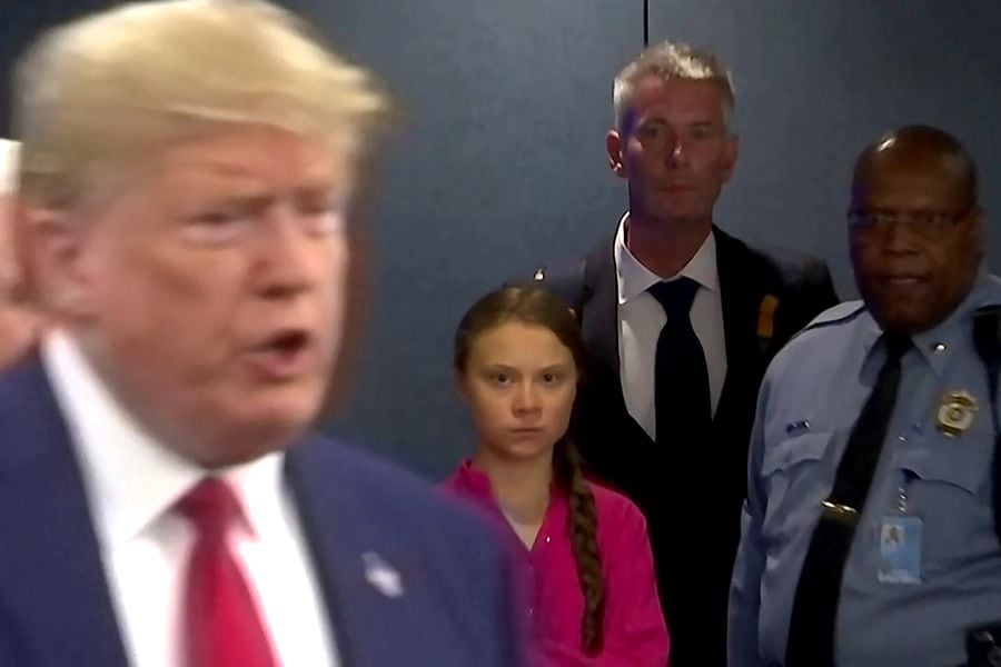 Swedish environmental activist Greta Thunberg watches as U.S. President Donald Trump enters the United Nations