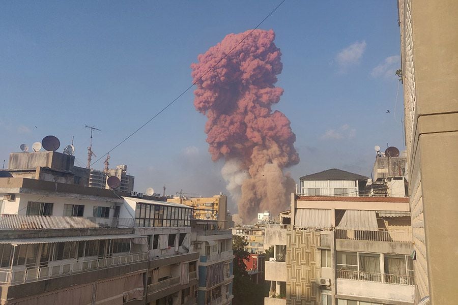 Smoke is seen after an explosion in Beirut