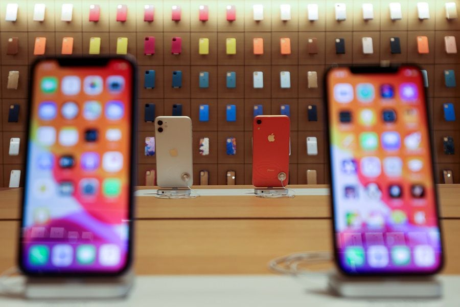 iPhones are displayed at the upcoming Apple Marina Bay Sands store in Singapore